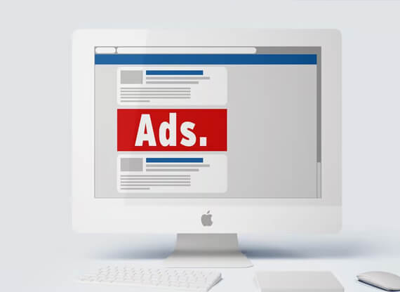 Ein weißer iMac zeigt das Mockup einer Website, welches aus Elementen einer Searchseite und einem auffallenden Anzeigenbereich mit der Aufschrift „Ads".