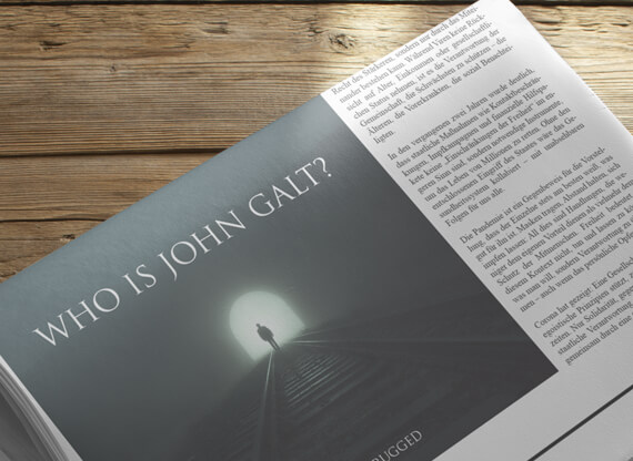 Auf der Rückseite einer zusammengerollten Tageszeitung verdeutlicht neben einer redaktionellen Spalte eine halbseitige Werbeanzeige für ein Ayn Rand Buch gedruckt das Anzeigenlayout in gedruckten Medien.