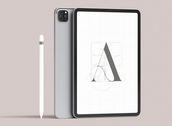 Ein Logo-Design für ein Unternehmen zeigt ein illustriertes A, das auf einem vertikal stehenden iPad auf einem Schreibtisch präsentiert wird und durch seine kreative Gestaltung sofort ins Auge fällt.